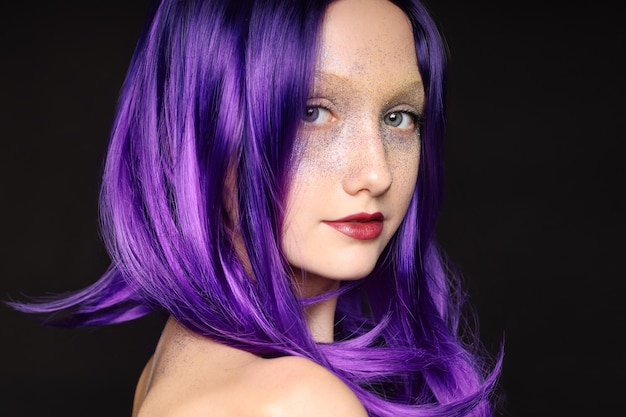 Close-up of a girl with bright hair,bright makeup,color