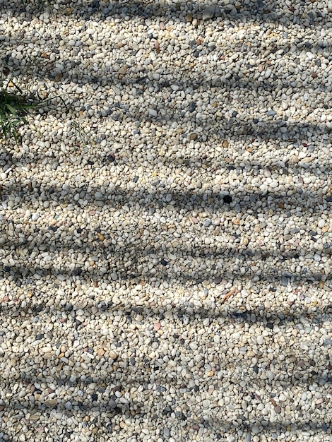 A close up of a gravel pattern with the word sea on it.