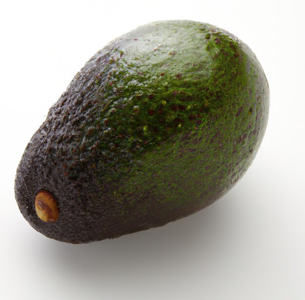 Close up of green avocado on white background created using generative ai technology