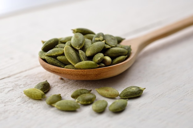 Close-up of green fruits on table