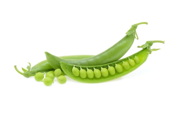 Close-up of green pea pods over white background