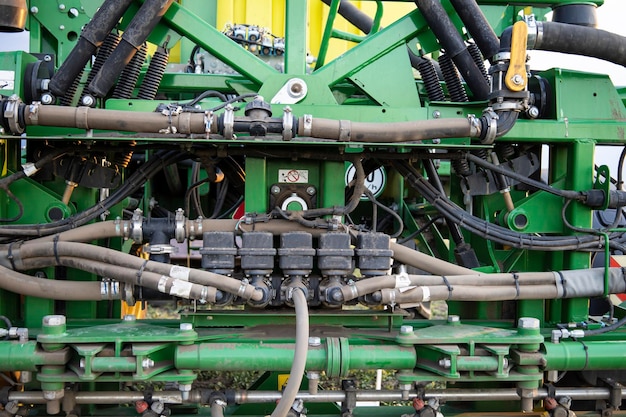 close up green sprayer to protect plants while working in the field.