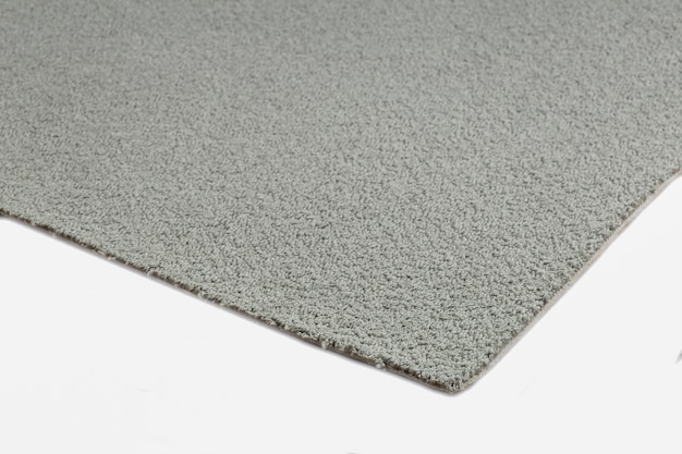 Close up on grey carpet texture isolated