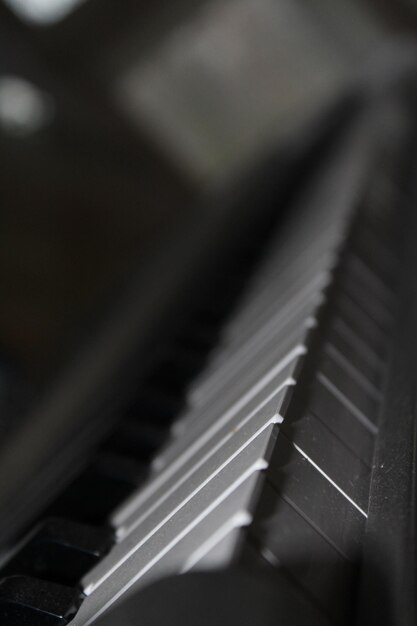 Photo close-up of guitar playing piano