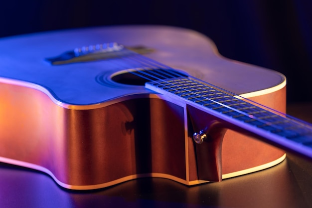 Close up of guitar and strings with shallow depth of field soft focus