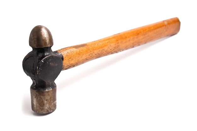 Close-up of hammer against white background