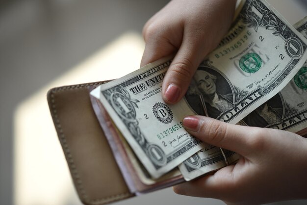 Close-up of hand holding money