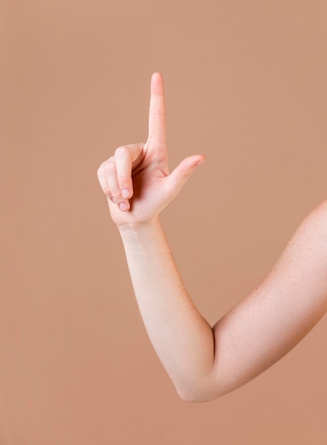 Close up of a hand teaching sign language