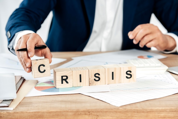 Close-up hand with letter cubes