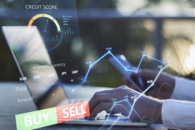 Close up of hands using laptop computer and smartphone with forex chart and sell buy buttons on blurry background Stock exchange cryptocurrency and global fund information concept Double exposure