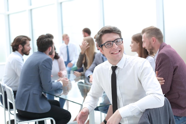 Close up happy businessman sitting in his office business concept