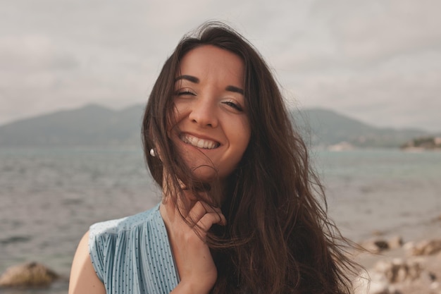 Close up Happy woman near ocean