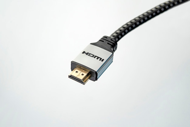 A close up of a HDMI cable on white background