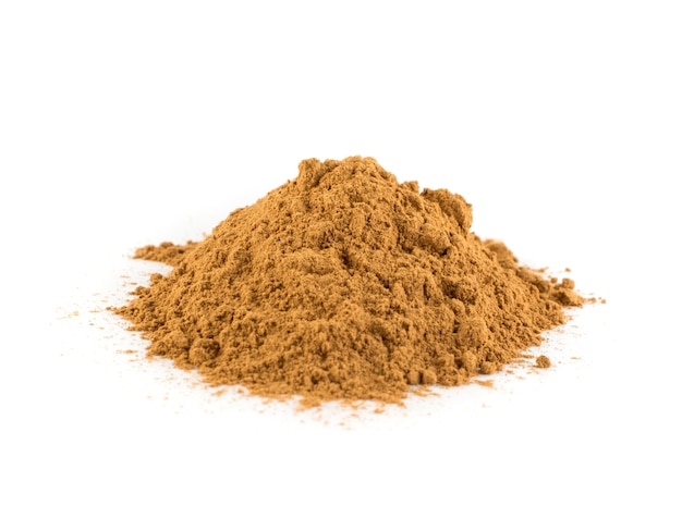 Close up on heap of Cinnamon Powder Isolated