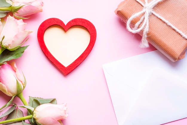 Close-up of heart shape and flowers with gift box