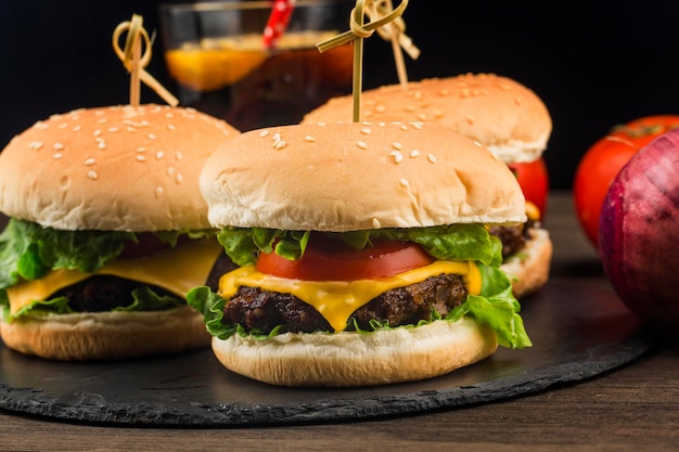 Close up of a homemade delicious beef hamburger on a wooden table.