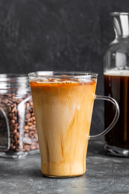 Close-up ice coffee with milk and sugar