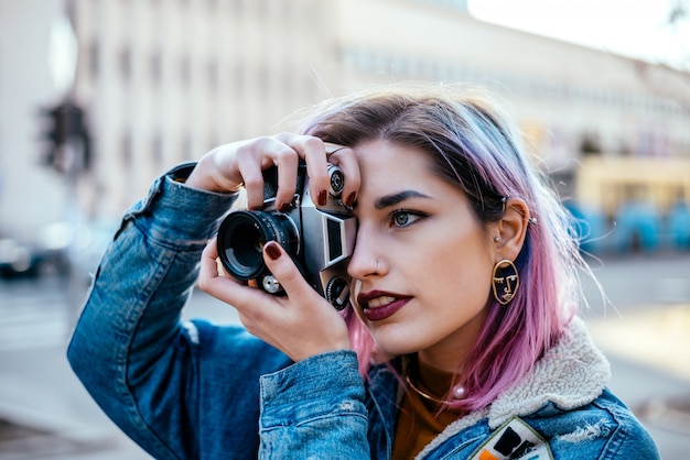 Close-up image of a beautiful female photographer.