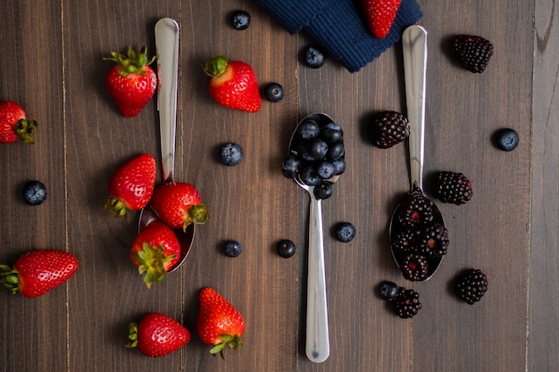 Close-up image of berries isolated, blueberry, strawberry, blackberry