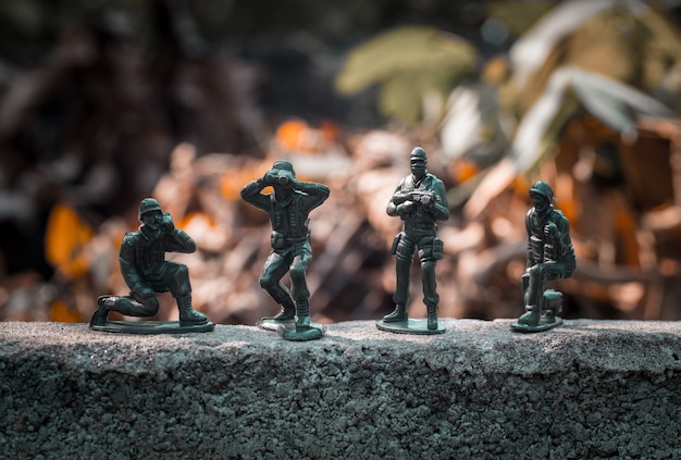 Close up image of  toy military army on battle field