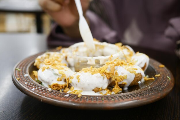 Close up of indain street of fuchka on a plate