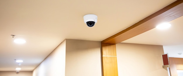 Close-up IP surveillance camera on the ceiling.