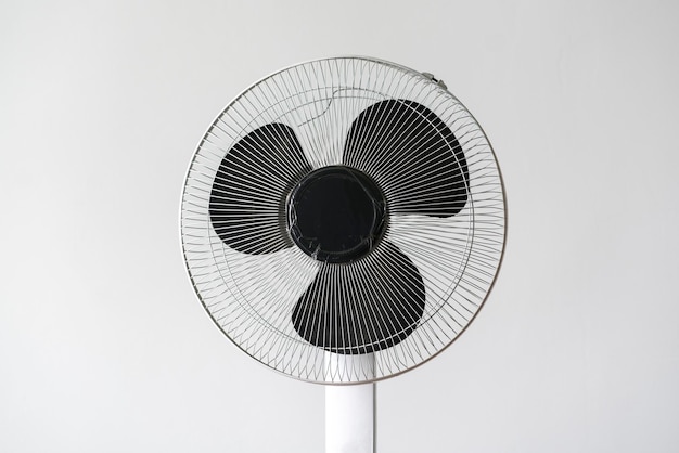 Close up isolated white ventilator fan at home