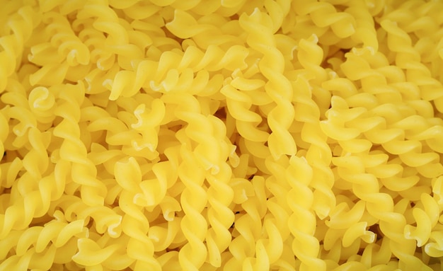 Close up Italian Fusilli Macaroni Pasta background or texture