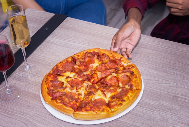 Close up a Italian pizza on a table.