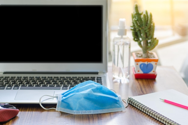 Close-up of laptop on table at home