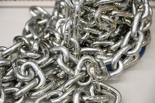 Close up of large steel chain folded in a heap