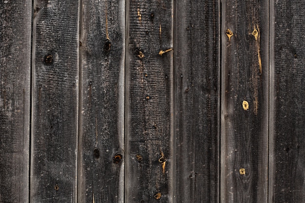 Close-up Large wooden gate and dried wood. Wood plank texture