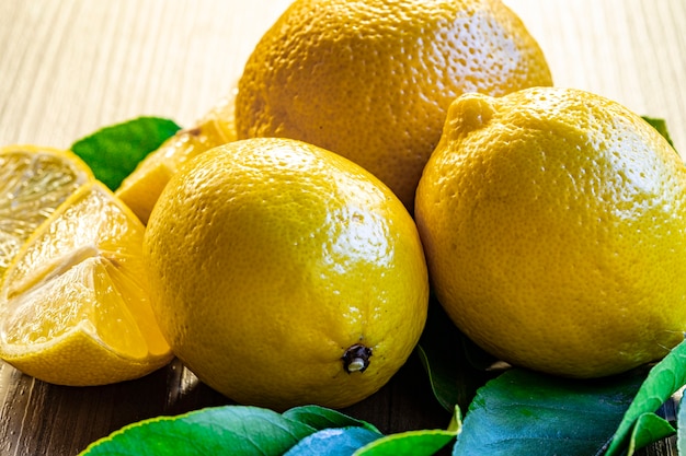 Close up of lemon on wooden background