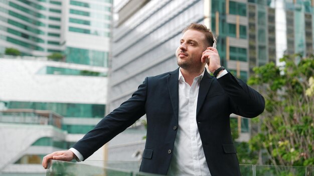 Close up of male leader listen headphone and dancing to relaxing music urbane