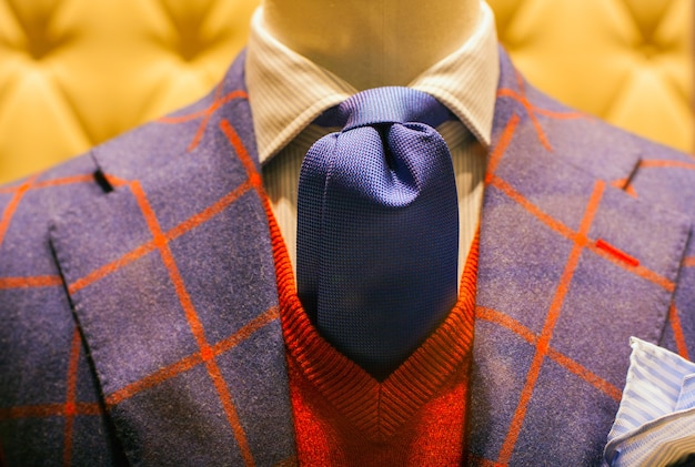 Photo close up of male suit exposed in the clothes shop