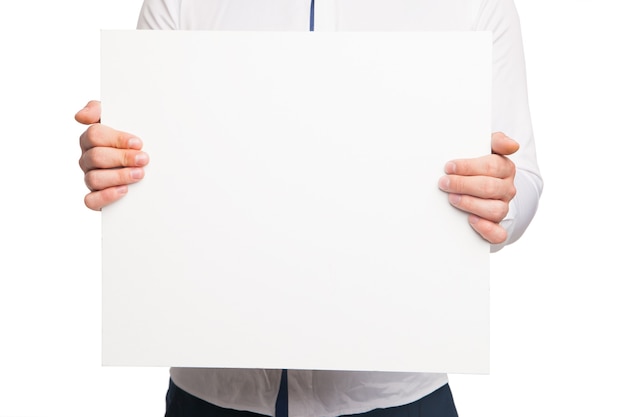 Close up of man hands showing white blank board isolated on white