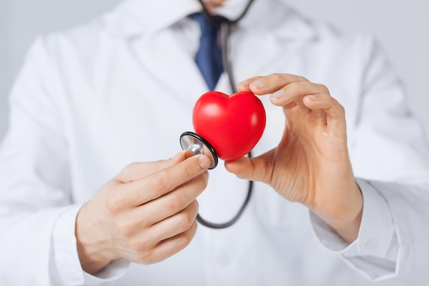 close up of man hands with heart