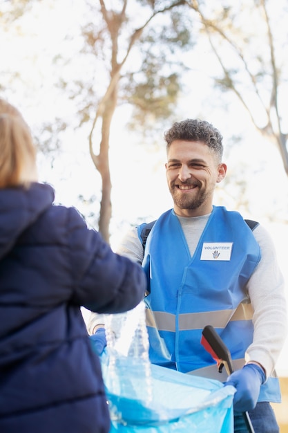 Close up man helping as volunteer