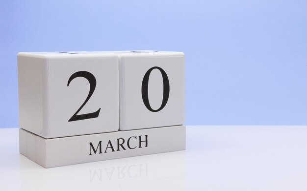 Photo close-up of march date against blue background