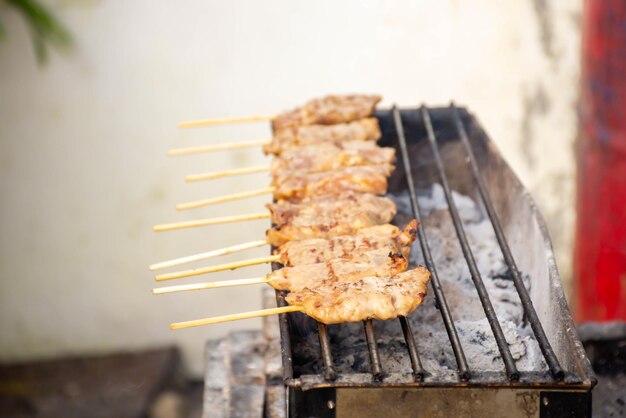 Close-up of meat on barbecue grill