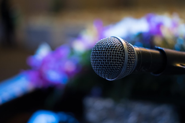 Close-up of microphone against blurred background