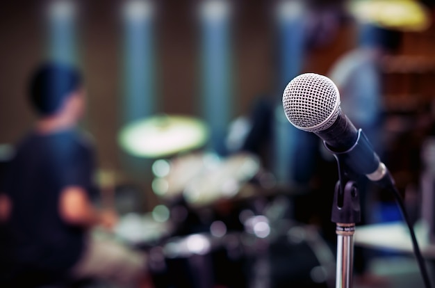 Close up of microphone on musician blurred background