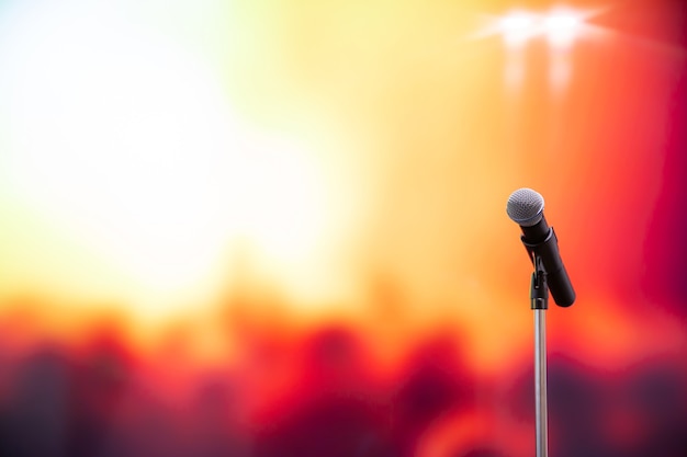 Close-up the microphone on stand with blur background.