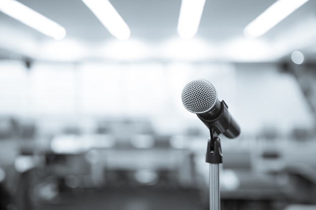 Close-up the microphone on stand with blur background.