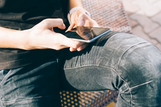 Close-up of a mobile phone in female hands