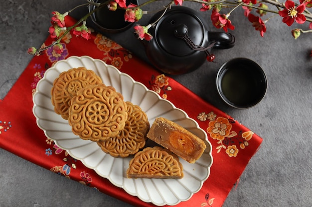 Close up moon cakes with black background. Mooncake is a traditional Chinese bakery