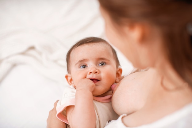 Close up on mother caring for her baby