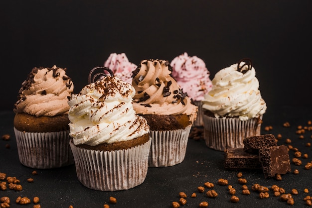 Close-up of muffins with piece of chocolates