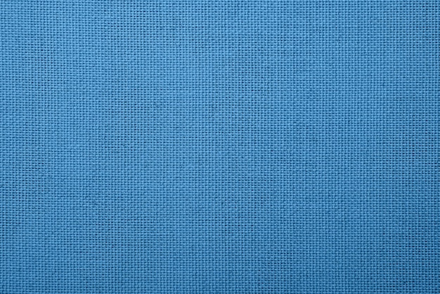 Close up natural blue rough cotton fabric canvas background texture