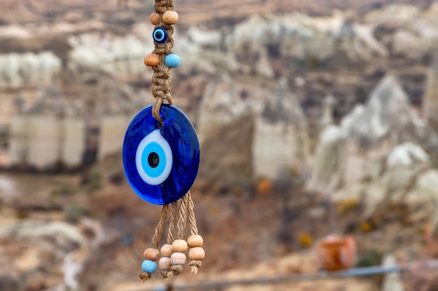 Close up of nazar or an eye-shaped amulet believed to protect against evil eye